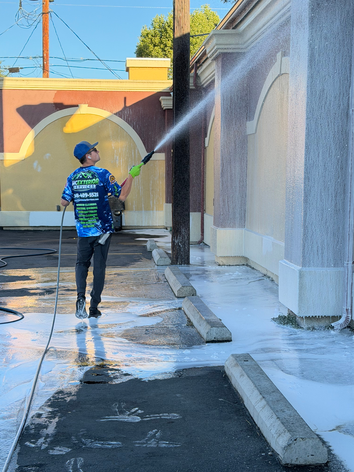 Soft washing a commercial stucco building